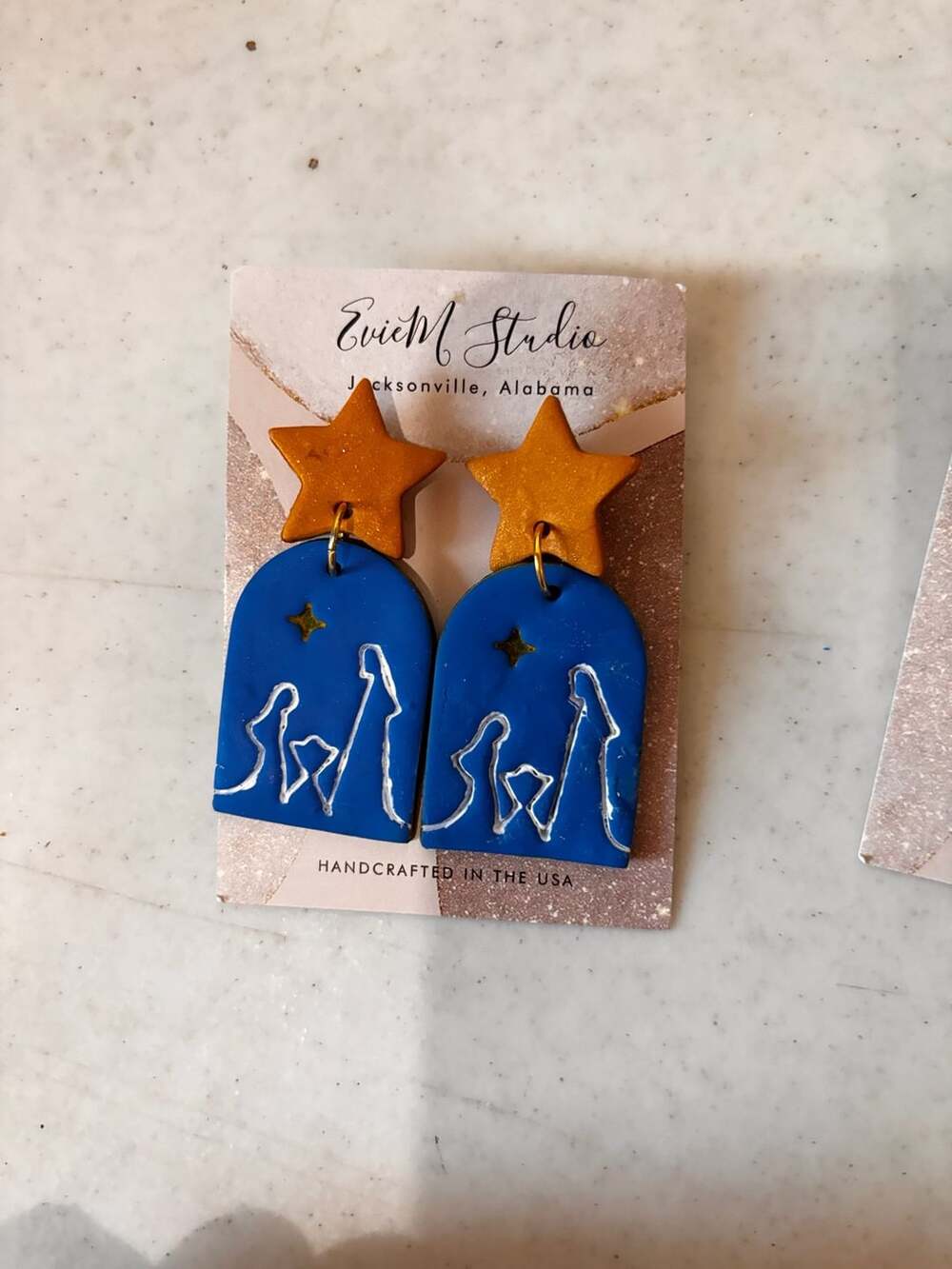 EvieM Studio Navy Blue Polymer Clay Nativity Scene Earrings with Gold Star